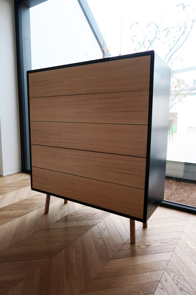 sideboard is cladded with a 1mm steel sheet and the fronts are made of oak veneer.